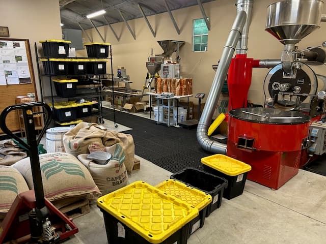 Roasting equipment and freshly roasted coffee at Nuanz